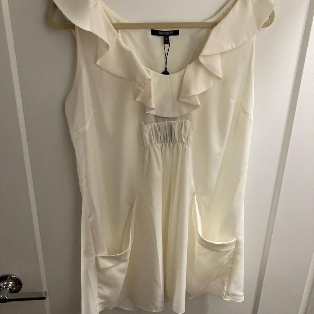 Flared Sleeveless/ruffle blouse